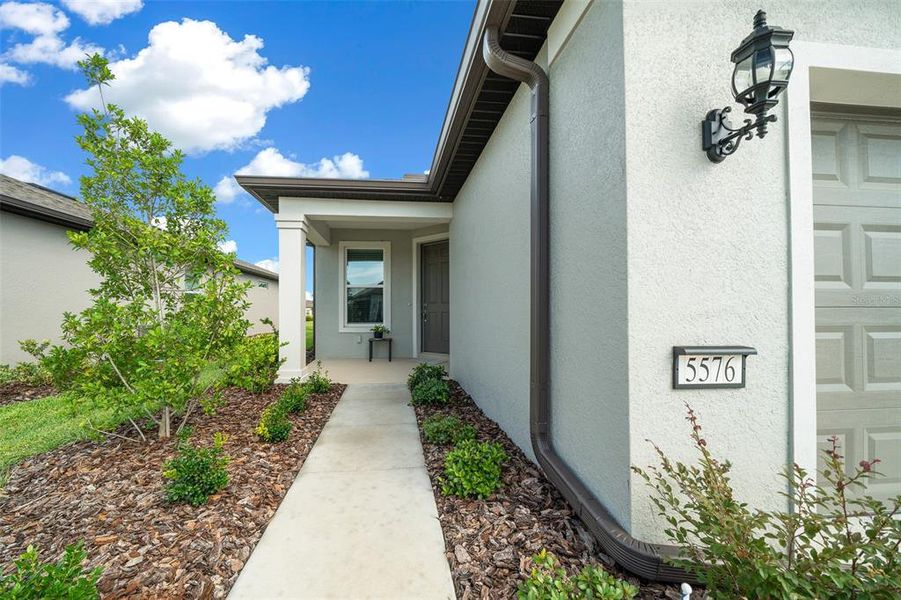 Front exterior of a new home in , Ocala, FL, highlighting curb appeal (Image 20).