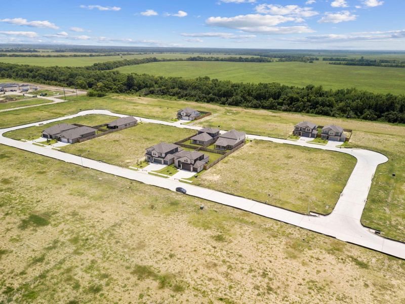 Aerial perspective of the surrounding area, offering peaceful views and open green spaces. Aerial perspective of the surrounding area, offering peaceful views and open green spaces.