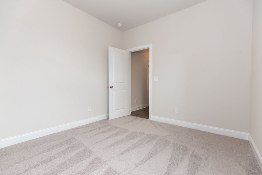 Representative unfurnished interior of a home built from the The Owens by The Providence Group in Waterhaven, Cumming (Image 38).