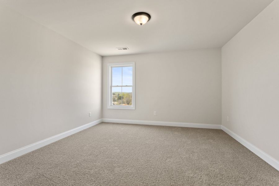 Spacious, unfurnished interior of a new home in Cherokee Knoll, Williamston (Image 23).