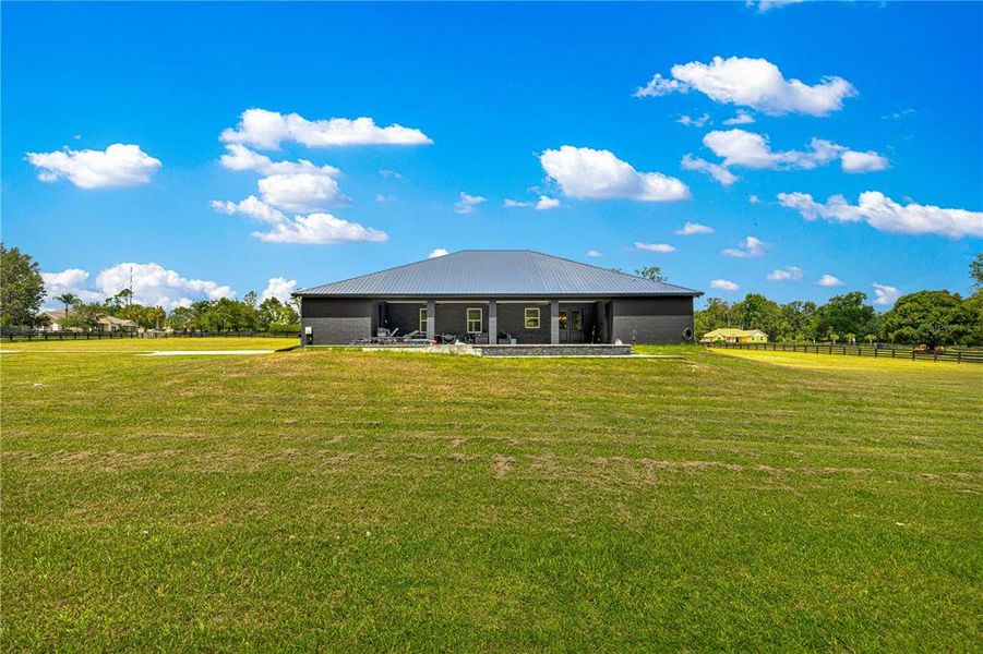 Front exterior of a new home in , Ocala, FL, highlighting curb appeal (Image 2). Front exterior of a new home in , Ocala, FL, highlighting curb appeal (Image 2).