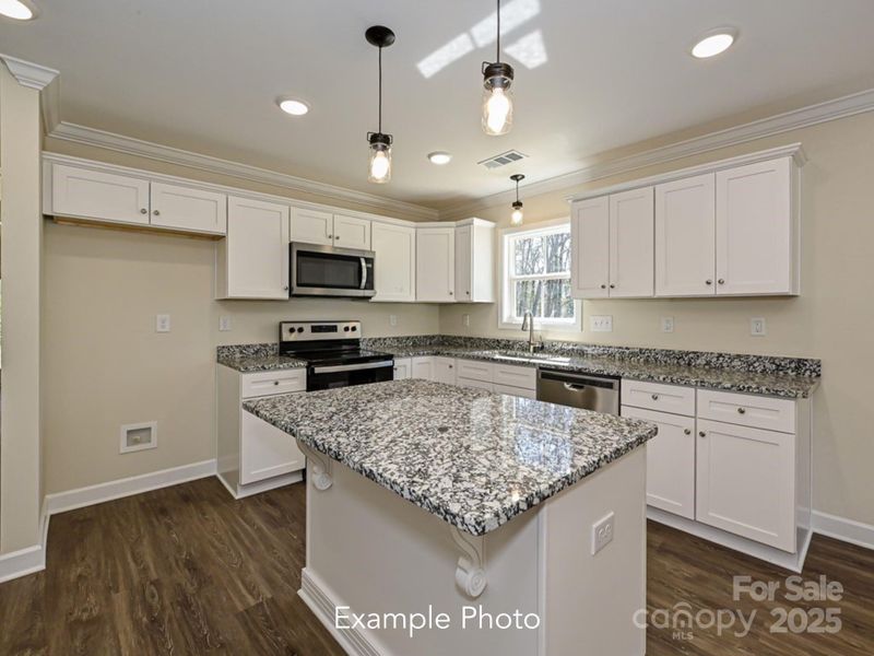 Example Photo Example Photo