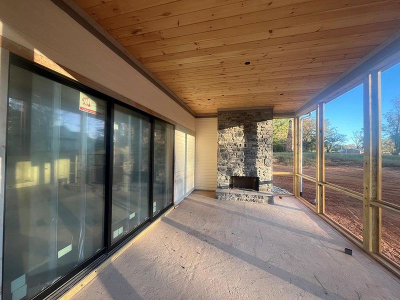 Exterior details and patio area of a home in , White (Image 34).
