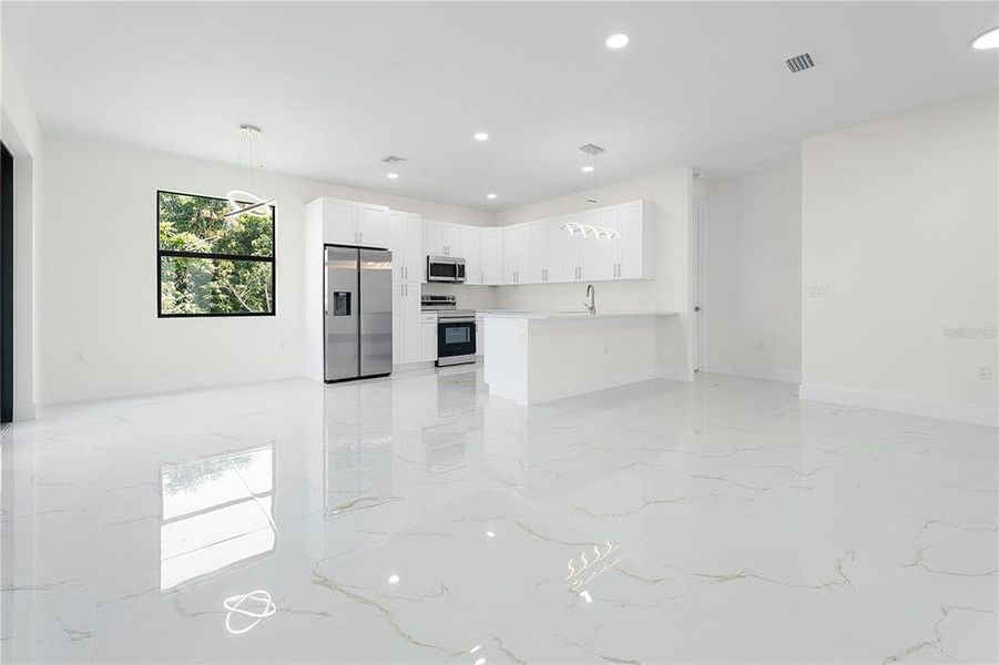 Spacious, unfurnished interior of a new home in , Port Charlotte (Image 8).