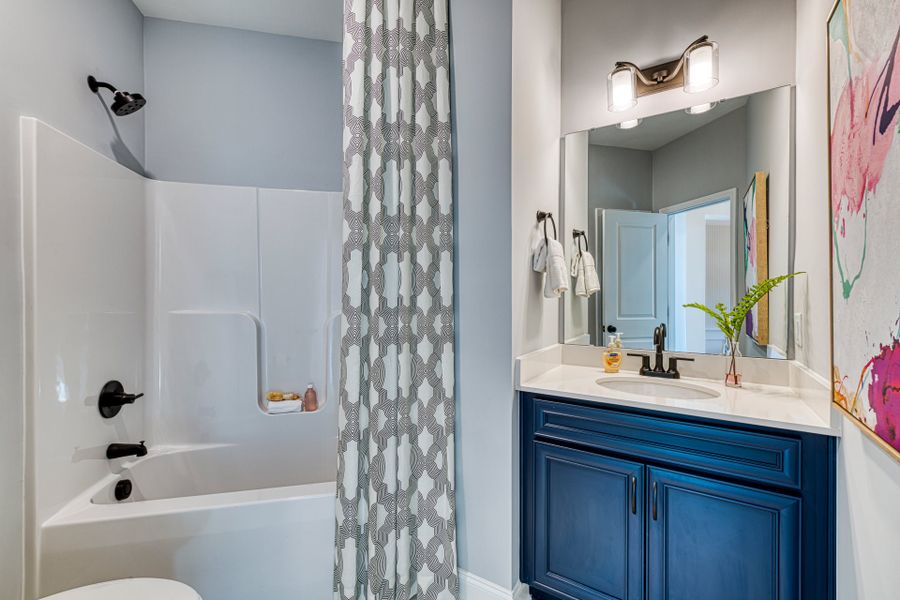 Representative furnished interior of a home built from the Promenade by McKee Homes in The Cottages at 78 North, Sanford (Image 15).