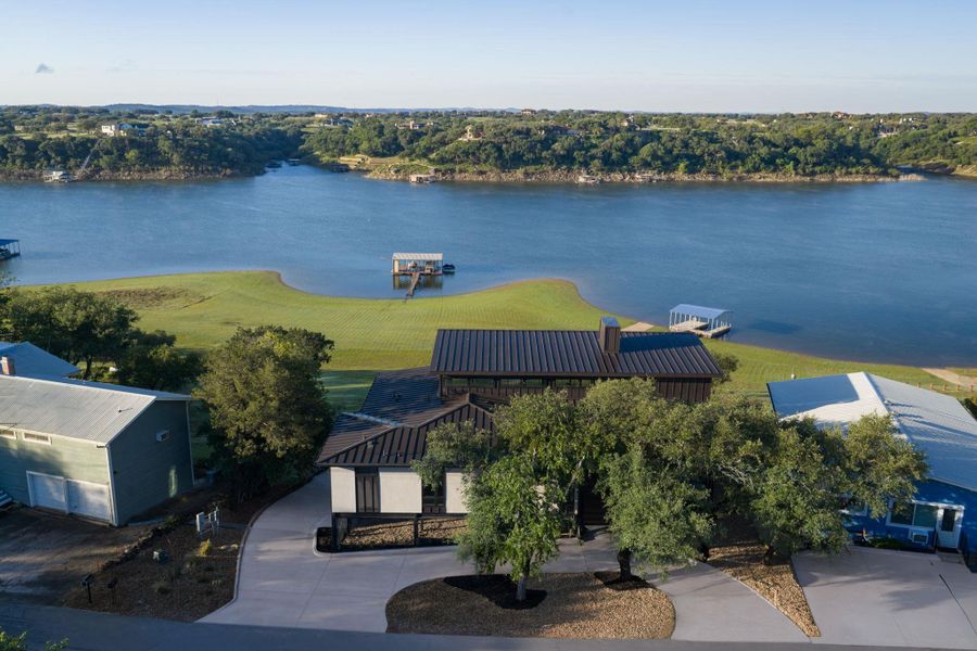 Contemporary architecture with a metal roof and dark exterior siding Contemporary architecture with a metal roof and dark exterior siding
