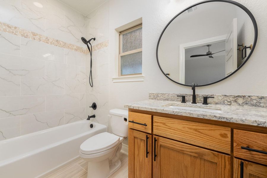 Bathroom with tub / shower combination and vanity Bathroom with tub / shower combination and vanity