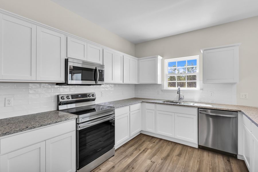 Representative furnished interior of a home built from the The Duncan by RTS Homes in The Village at Sassafras, Allenhurst (Image 6).