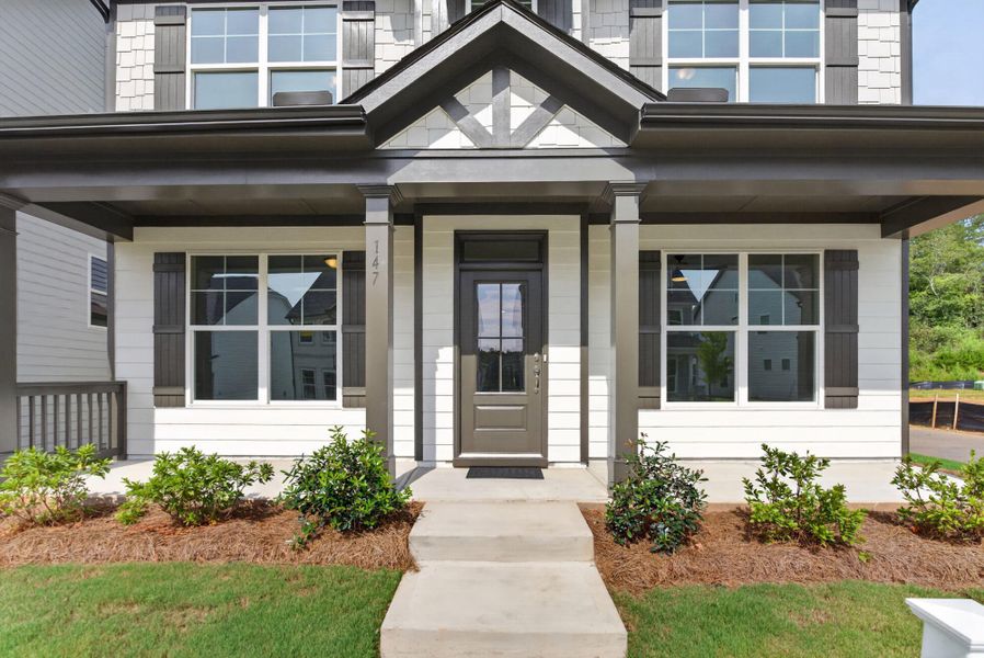 Exterior details and patio area of a home in Marble Tree, Ball Ground (Image 3).