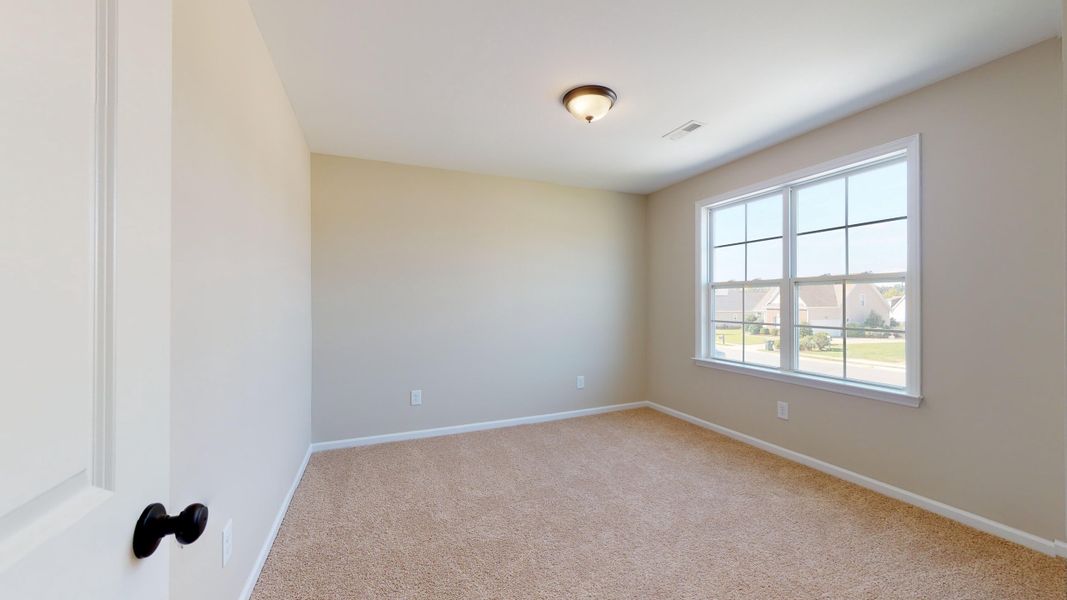Representative unfurnished interior of a home built from the Rockbridge by Bill Clark Homes in Davenport Farms, Winterville (Image 47).