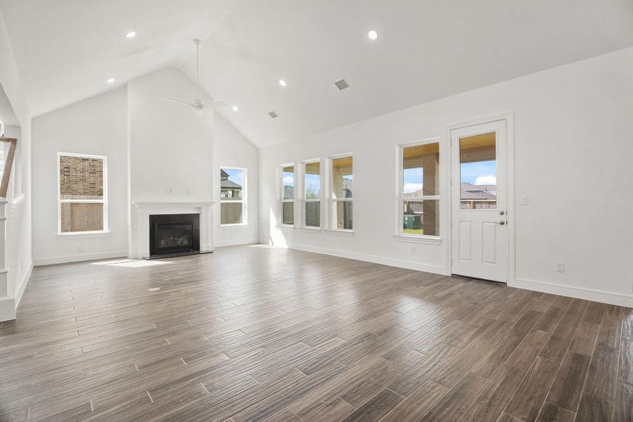Impressive dining area and great room with cozy fireplace (*Photo not of actual home and used for illustration purposes only.) Impressive dining area and great room with cozy fireplace (*Photo not of actual home and used for illustration purposes only.)
