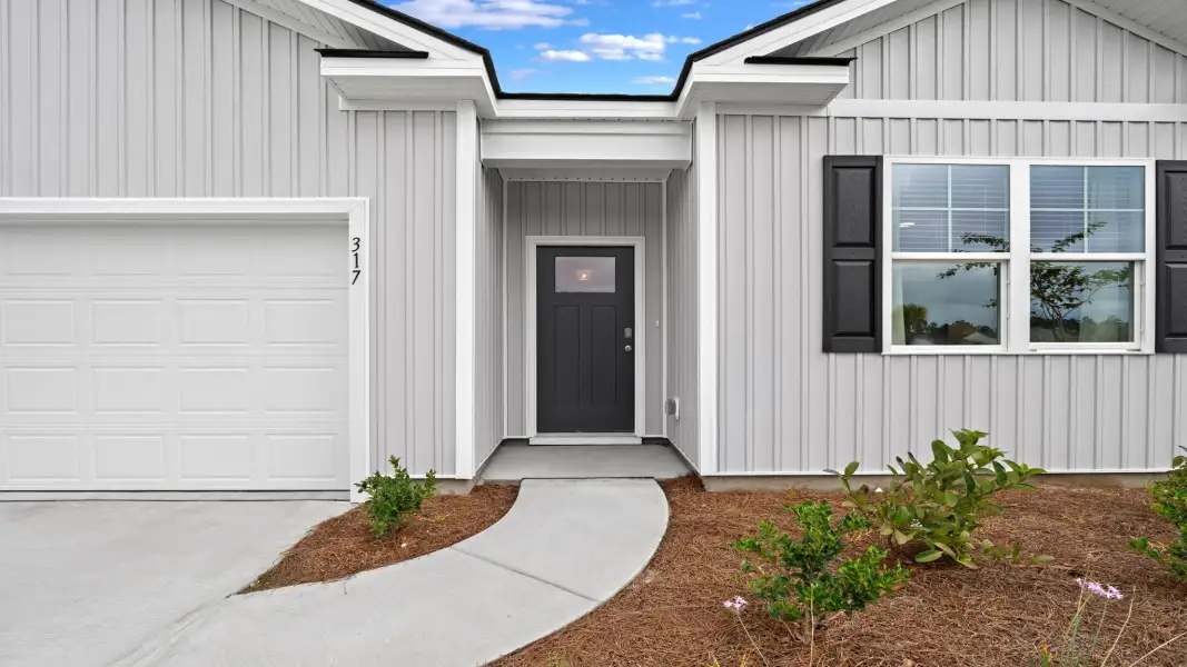 Exterior details and patio area of a home in The Pines at New Hampstead, Bloomingdale (Image 24).