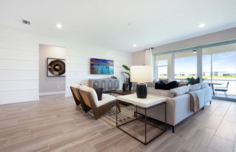 Representative furnished interior of a home built from the Easley by DiVosta in Emerson Oaks, Vero Beach (Image 10).