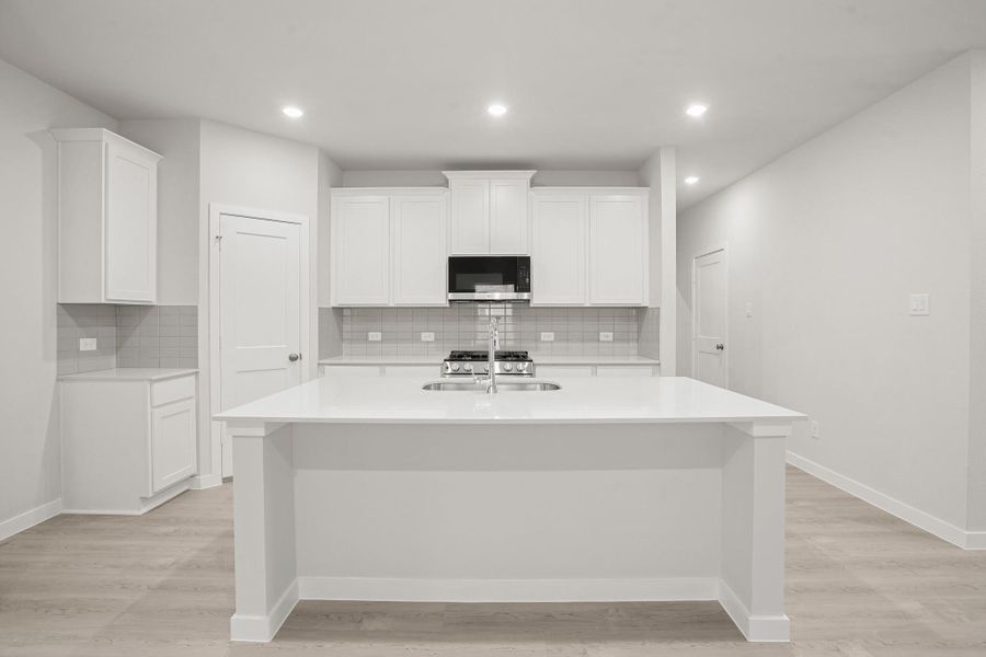 Furnished interior view inside a new home in Sunterra, Katy (Image 9).