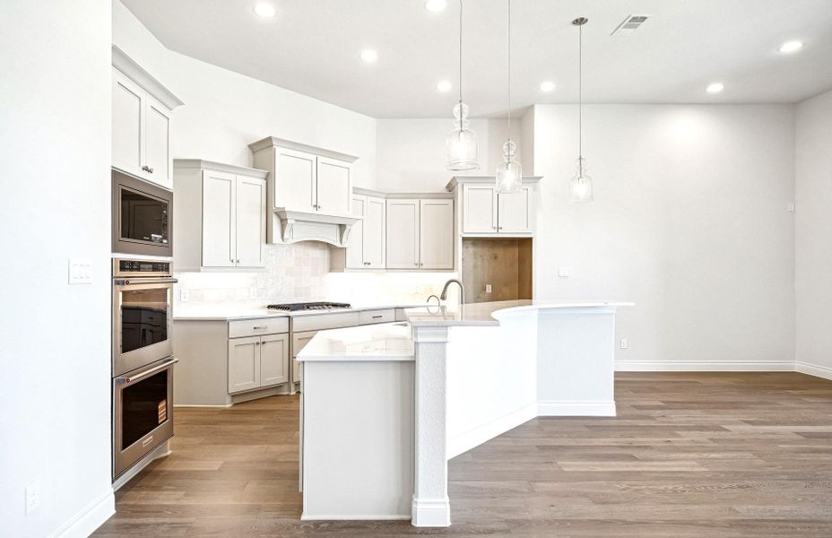 Furnished interior view inside a new home in Bridgeland 60′, Cypress (Image 10).