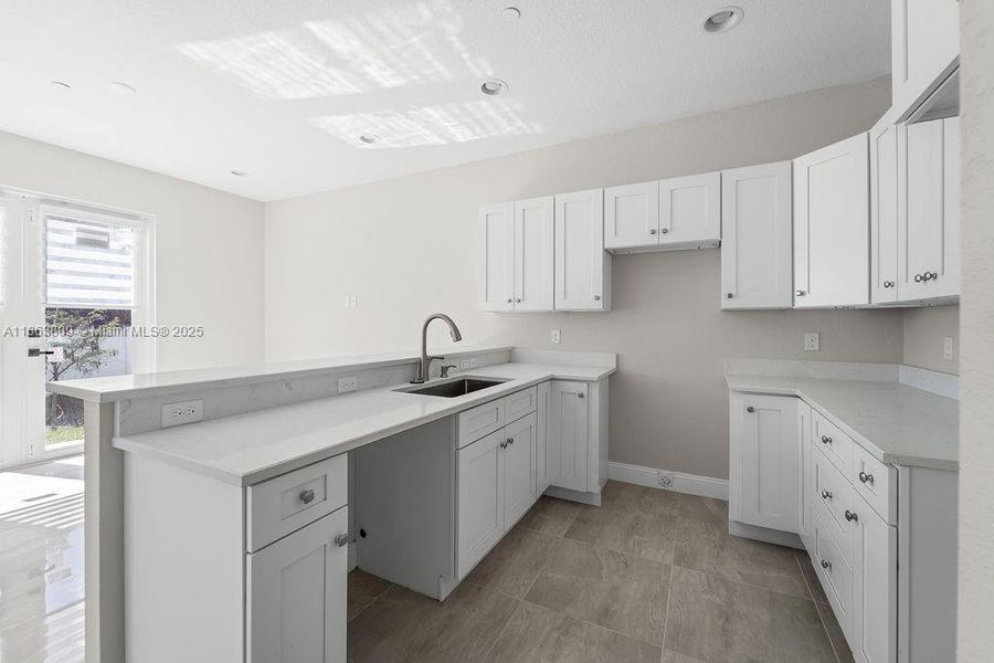 Furnished interior view inside a new home in , Tamarac (Image 3).