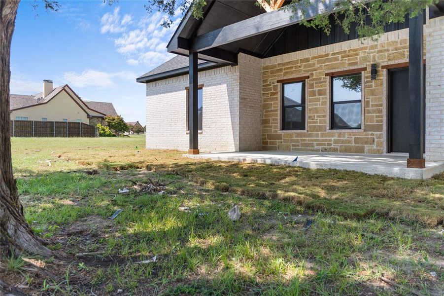 Front exterior of a new home in , Corsicana, TX, highlighting curb appeal (Image 15). Front exterior of a new home in , Corsicana, TX, highlighting curb appeal (Image 15).