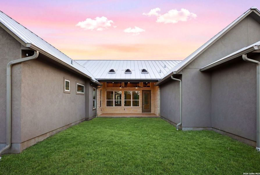 Exterior details and patio area of a home in , Blanco (Image 34).