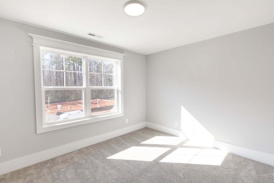 Representative unfurnished interior of a home built from the Austin by Caviness & Cates Communities in Bartlett Manor, Youngsville (Image 139).