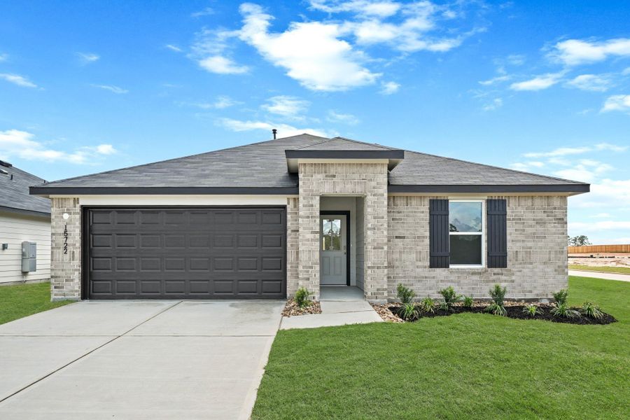 Front exterior of a new home in Chapel Lakes, Montgomery, TX, highlighting curb appeal (Image 2). Front exterior of a new home in Chapel Lakes, Montgomery, TX, highlighting curb appeal (Image 2).