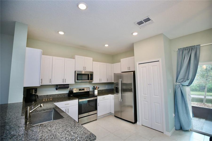 Furnished interior view inside a new home in , Land O' Lakes (Image 8).