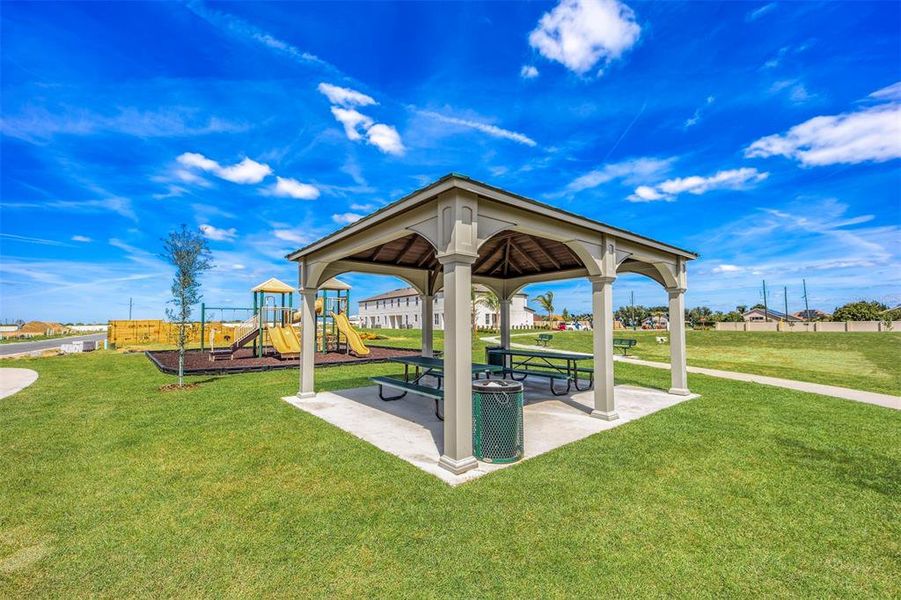 Front exterior of a new home in Sol Vista, Dundee, FL, highlighting curb appeal (Image 14).