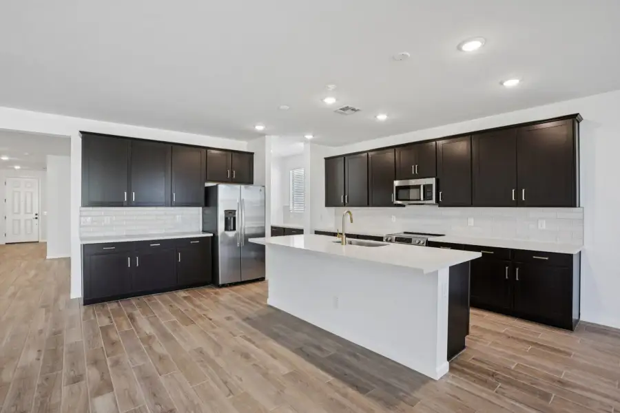 Kitchen - Sanctuary at Stonebridge Model Home. Finishes and options may vary by community