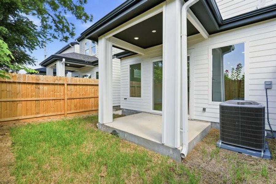 Exterior details and patio area of a home in , Houston (Image 3).