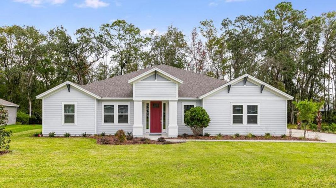 Representative exterior photo of a completed home built from the Armona by Taylor Morrison in Osprey Cove, St. Marys, GA (Image 1). Representative exterior photo of a completed home built from the Armona by Taylor Morrison in Osprey Cove, St. Marys, GA (Image 1).