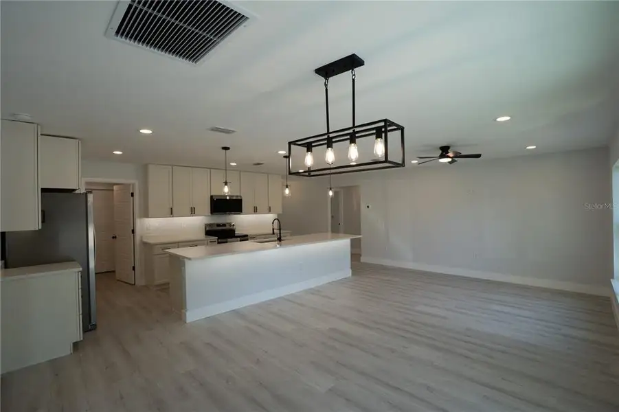 Furnished interior view inside a new home in , Dunnellon (Image 6).