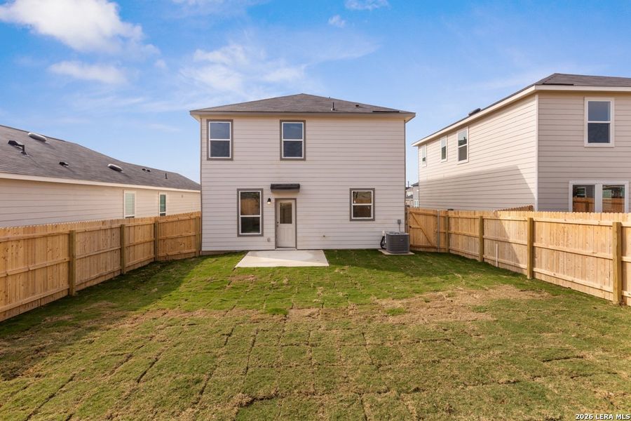 Exterior details and patio area of a home in Southton Cove, Elmendorf (Image 3). Exterior details and patio area of a home in Southton Cove, Elmendorf (Image 3).