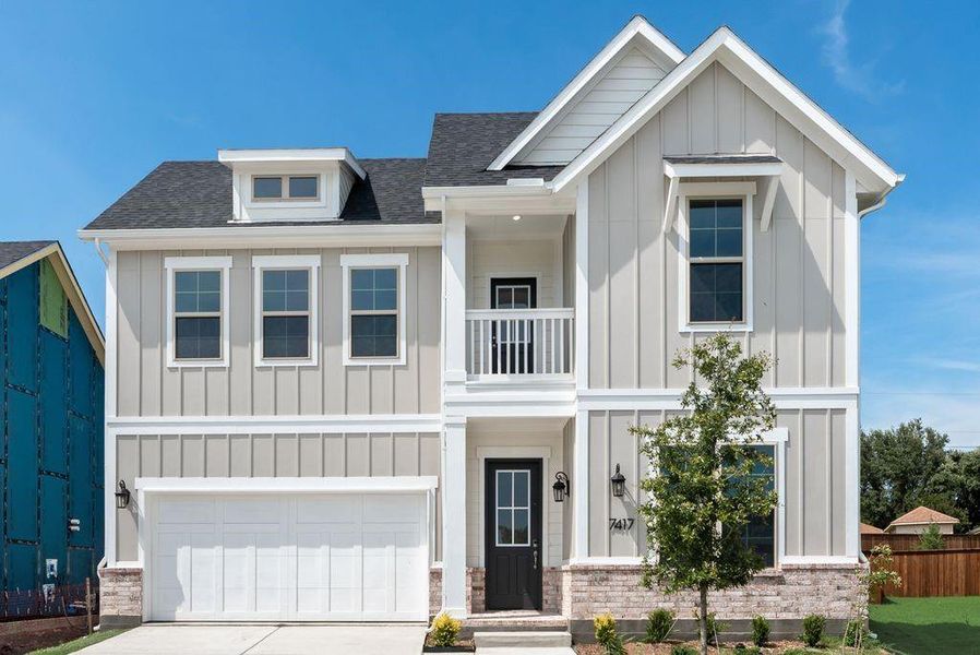 Front exterior of a new home in Bayside, Rowlett, TX, highlighting curb appeal (Image 22).