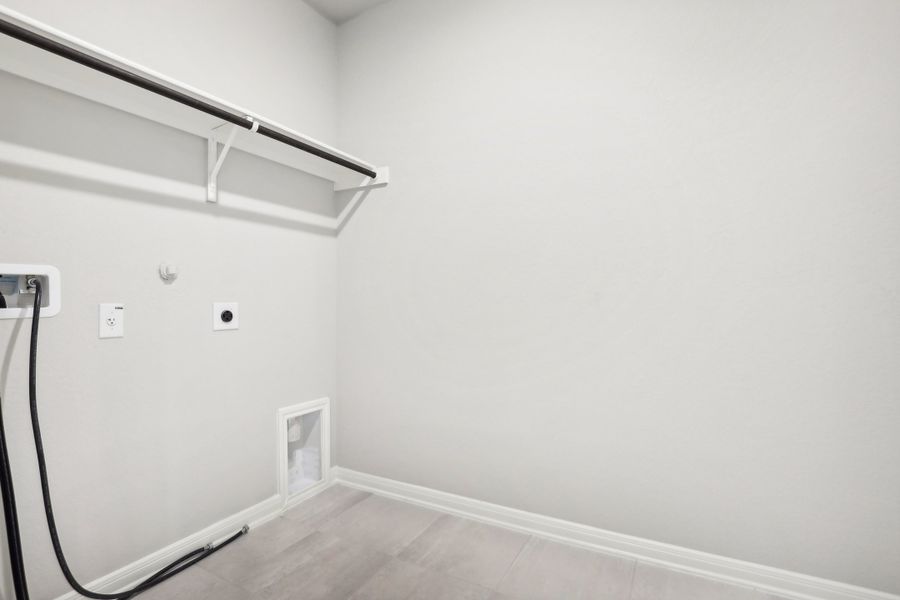 Laundry room in the Oleander floorplan at a Meritage Homes community. Laundry room in the Oleander floorplan at a Meritage Homes community.