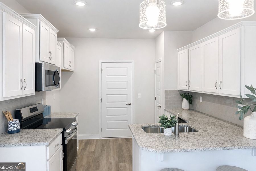 Furnished interior view inside a new home in Canterbury Villas, Carrollton (Image 9).