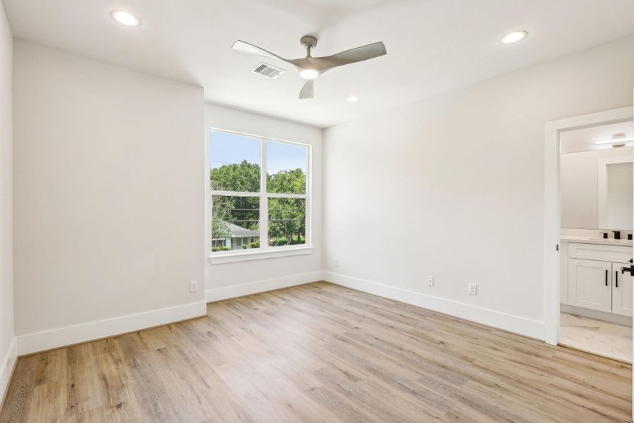 Third bedroom with ceiling fan