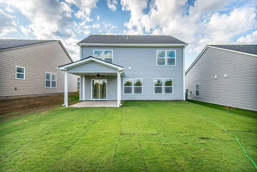 Representative exterior photo of a completed home built from the Heatherwood by Enchanted Homes in Ballentine Ridge, Lyman, SC (Image 2).
