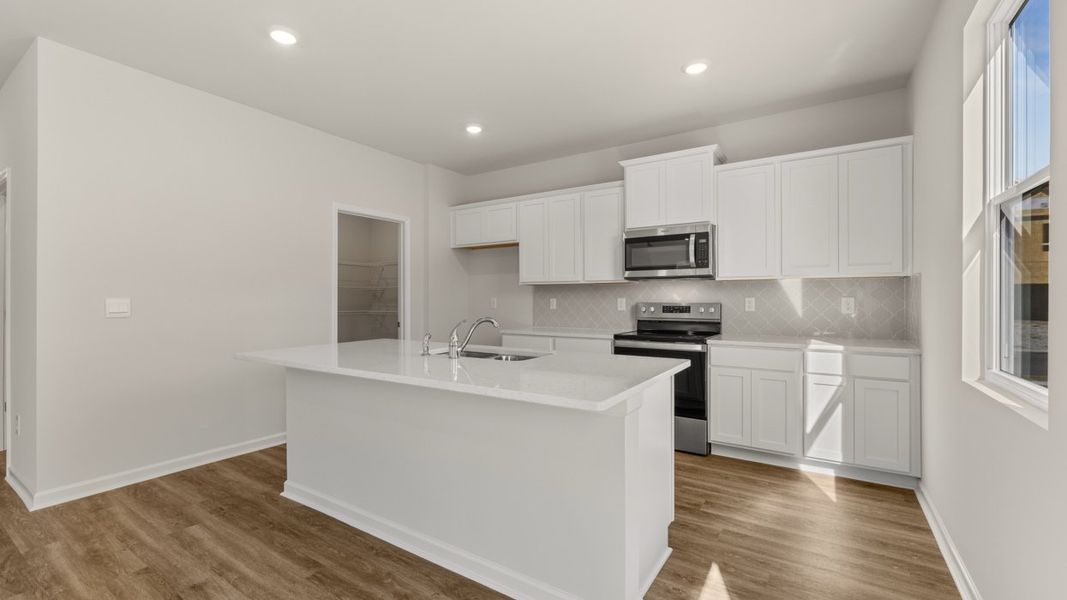 Representative furnished interior of a home built from the Galen by D.R. Horton in Fox Crossing, Griffin (Image 6).