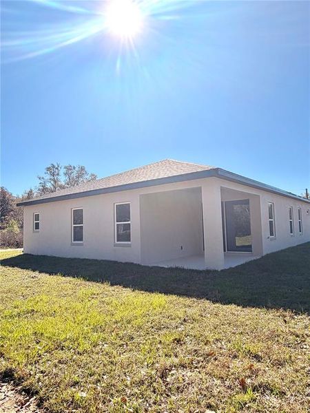 Exterior details and patio area of a home in , Center Hill (Image 3). Exterior details and patio area of a home in , Center Hill (Image 3).