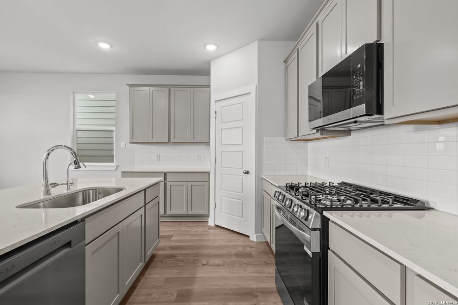 Furnished interior view inside a new home in Senna, Leon Valley (Image 10).