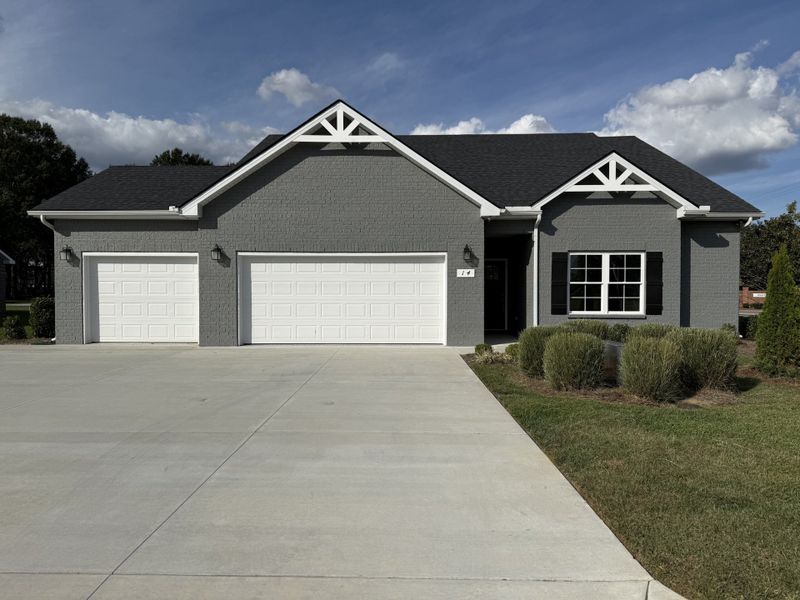 Front exterior of a new home in Fox Run, Manchester, TN, highlighting curb appeal (Image 1). Front exterior of a new home in Fox Run, Manchester, TN, highlighting curb appeal (Image 1).