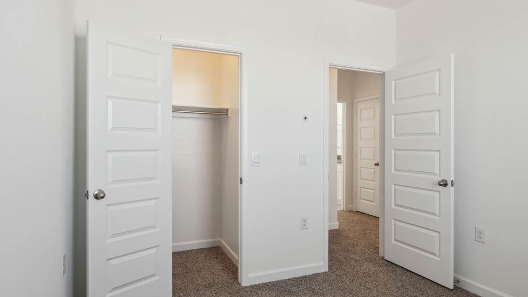 Representative unfurnished interior of a home built from the Mitchell by D.R. Horton in Upper Canyon, Phoenix (Image 30).