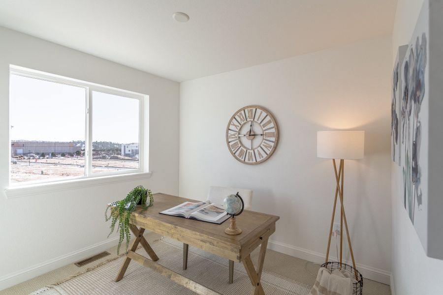 Representative furnished interior of a home built from the Tristyn by Lokal Homes in Victory Ridge, Colorado Springs (Image 13).
