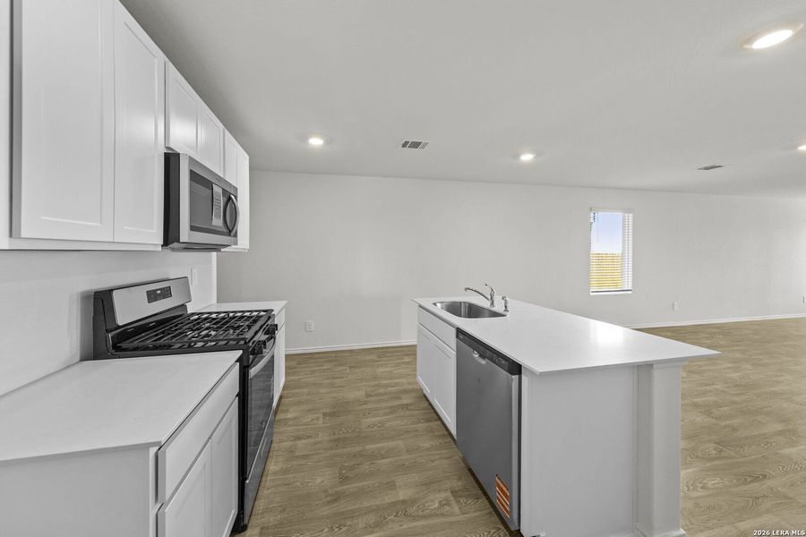 Furnished interior view inside a new home in Hickory Ridge, Elmendorf (Image 7).