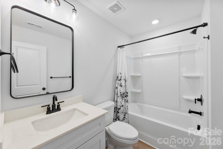 Furnished interior view inside a new home in Surrey Woods, Charlotte (Image 16).