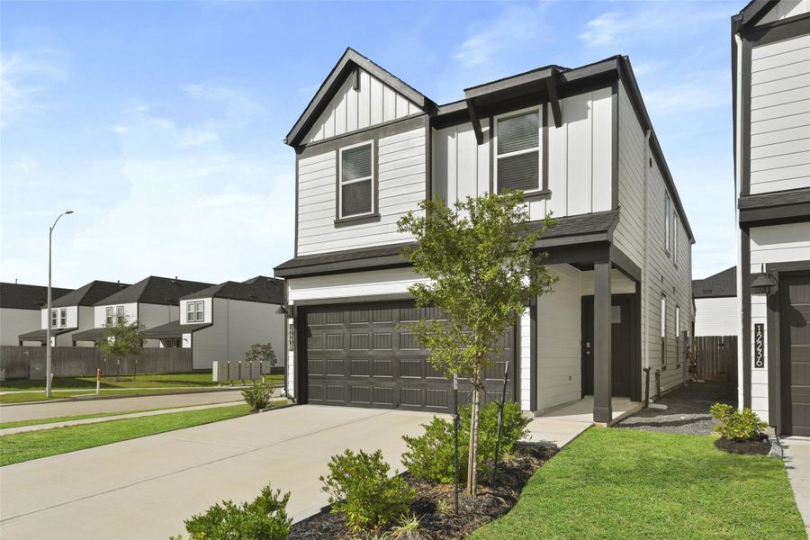 Front exterior of a new home in City Gate North, Houston, TX, highlighting curb appeal (Image 20).