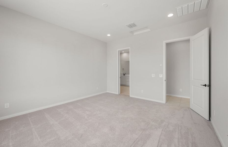 Spacious, unfurnished interior of a new home in Legado West, Queen Creek (Image 26).