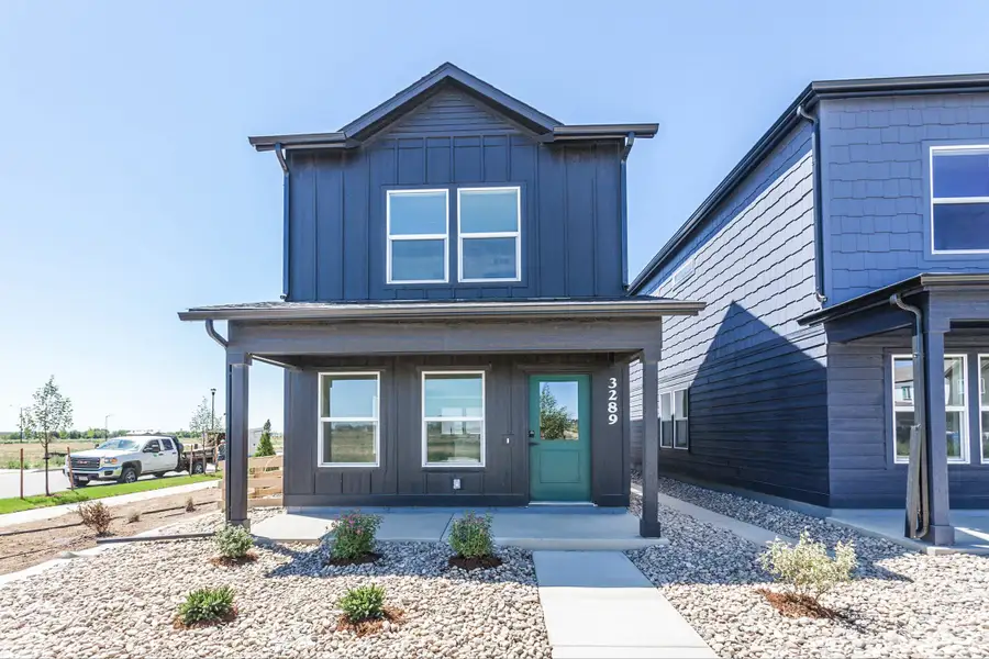 Front exterior of a new home in Bloom, Fort Collins, CO, highlighting curb appeal (Image 1). Front exterior of a new home in Bloom, Fort Collins, CO, highlighting curb appeal (Image 1).