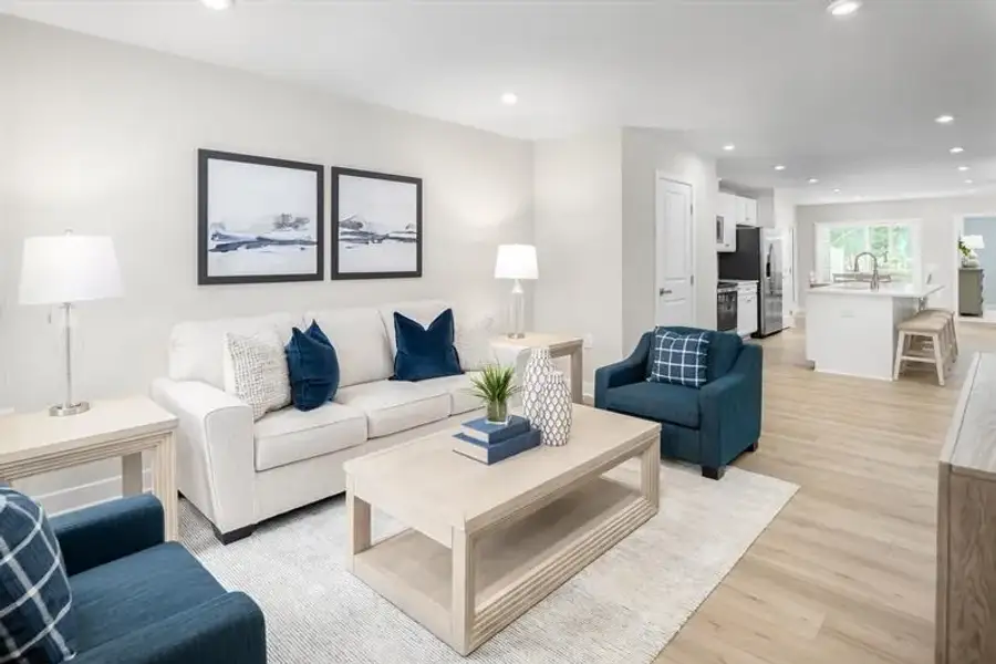 Representative furnished interior of a home built from the Nassau Cove - 3253 Edgehill Drive by Ryan Homes in Lakes at Riverbend, Navassa (Image 8).