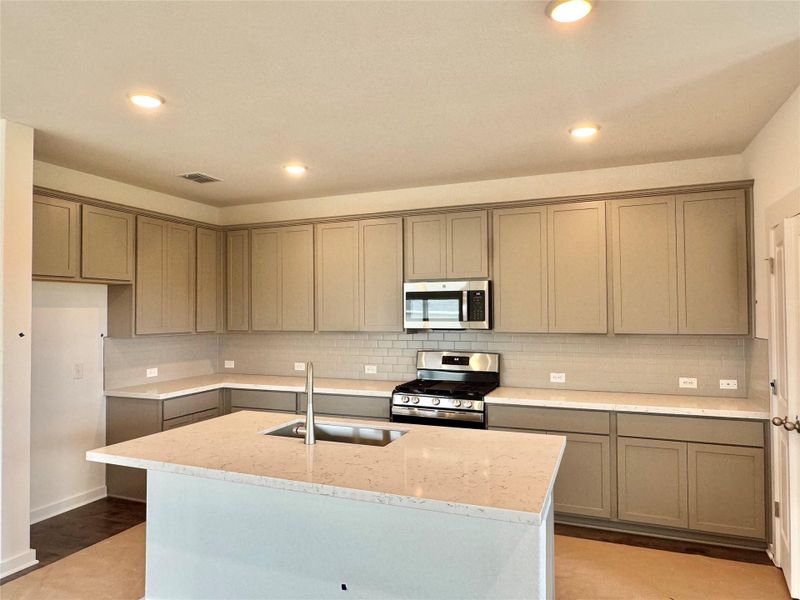 Furnished interior view inside a new home in Carillon, Manor (Image 9).