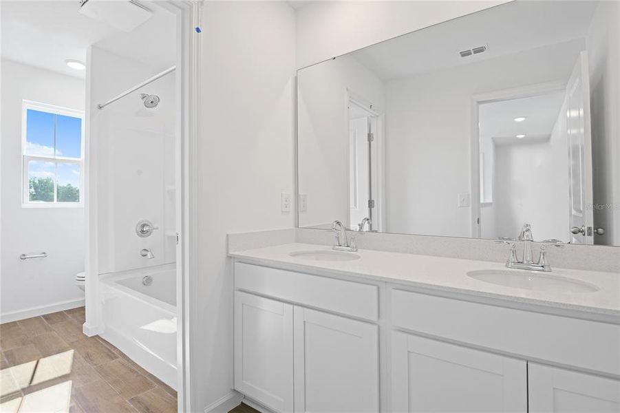 Furnished interior view inside a new home in Seasons at Shores of Lake Dell, Dundee (Image 2).